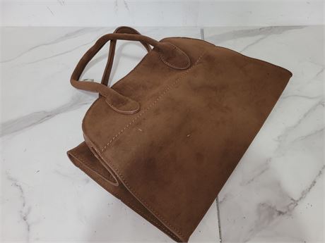 Brown Suede Handbag and Packaged Item